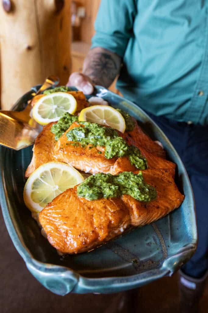 Salmon is served for dinner as part of the wilderness fine dining experience